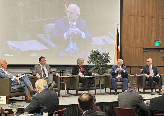 Five panelists on a stage at Galveston Economic Development Summit.