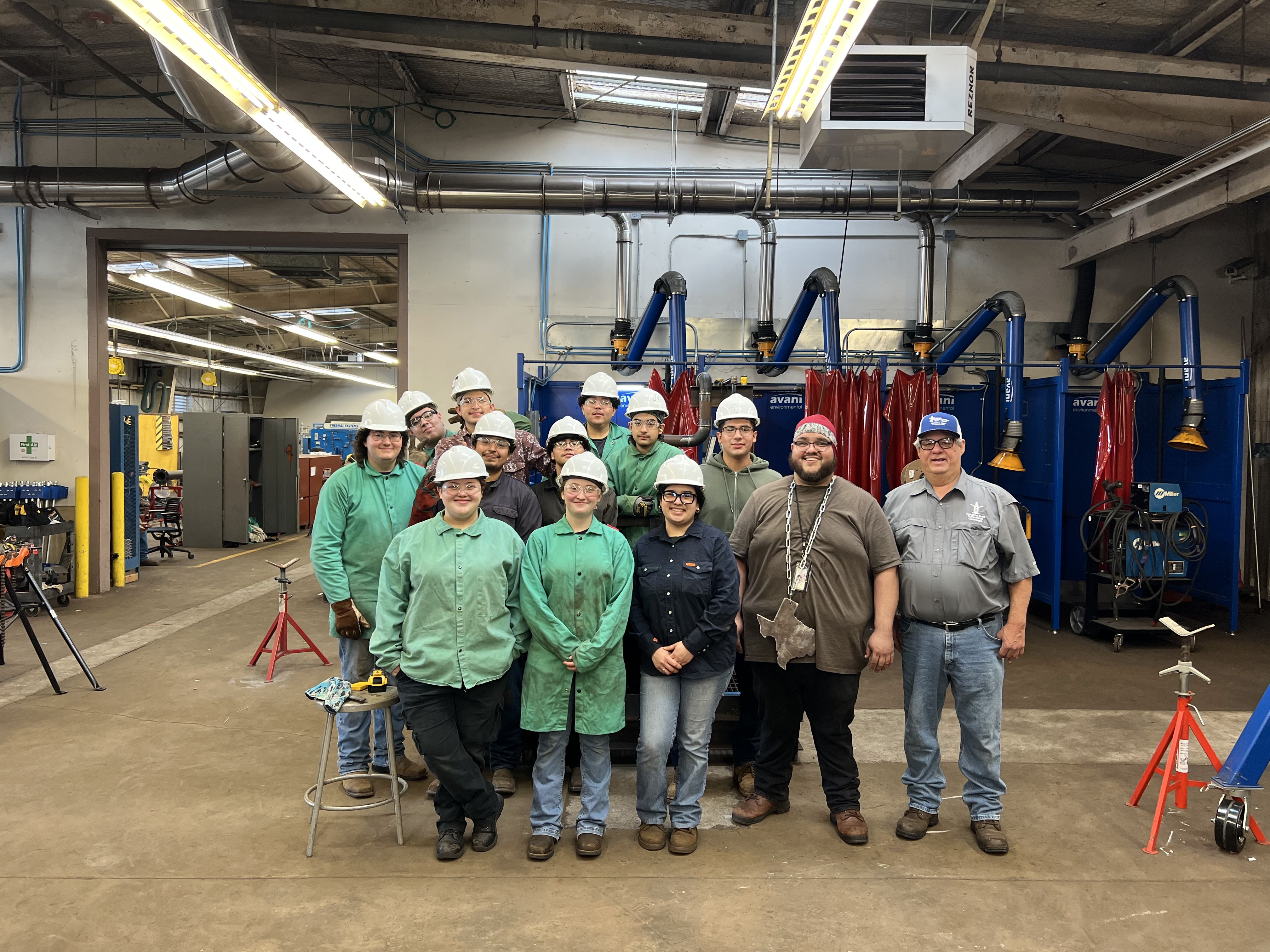 welding students with teacher James love