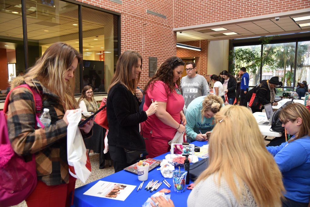 Students enjoy the campus and community Involvement Fair Jan. 29 in the Mary Moody Northen Center Atrium.